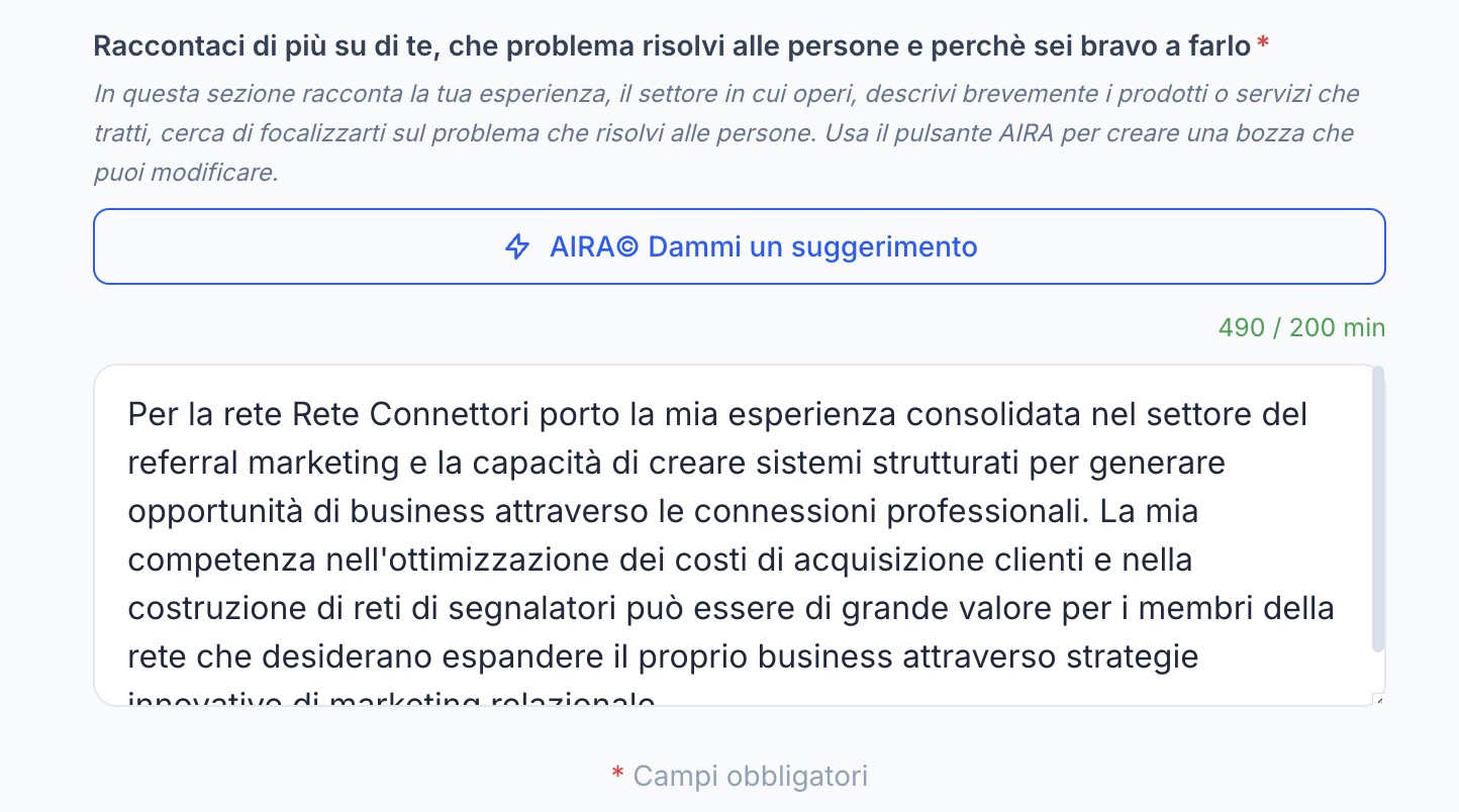 El campo de biografía del onboarding: «Cuéntanos más sobre ti, qué problema resuelves a las personas y por qué se te da bien hacerlo», con el botón AIRA© Dame una sugerencia y un texto de ejemplo.